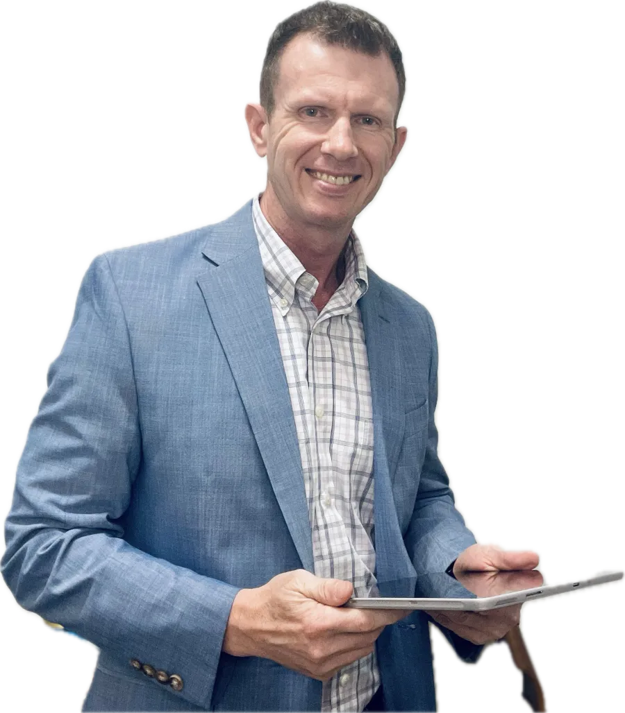 Danny Garner, founder of Geaux Techie, smiling and holding a tablet
